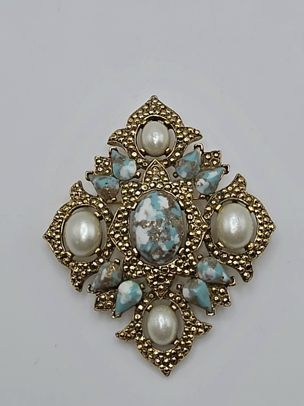 Sarah Coventry Gold-Tone Brooch with Turquoise and Pearlescent Accents